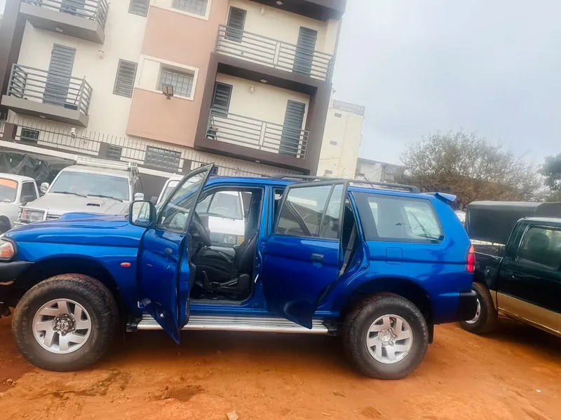 The Pajero with its front and rear doors open